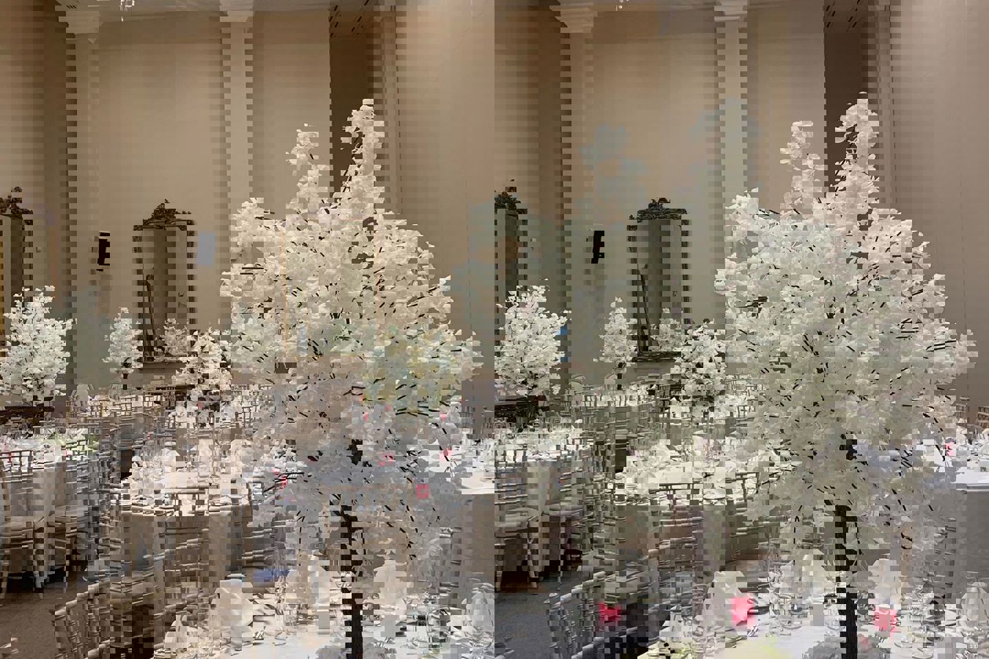 White tree table decor at a multicultural wedding