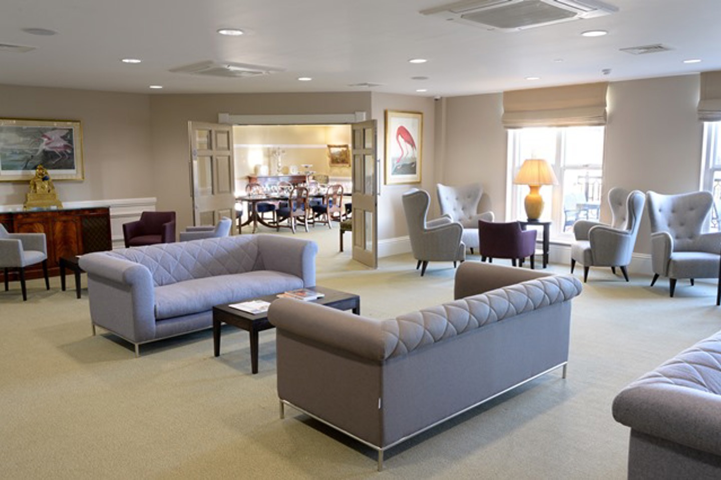 Private lounge area with sofas, tables and chairs