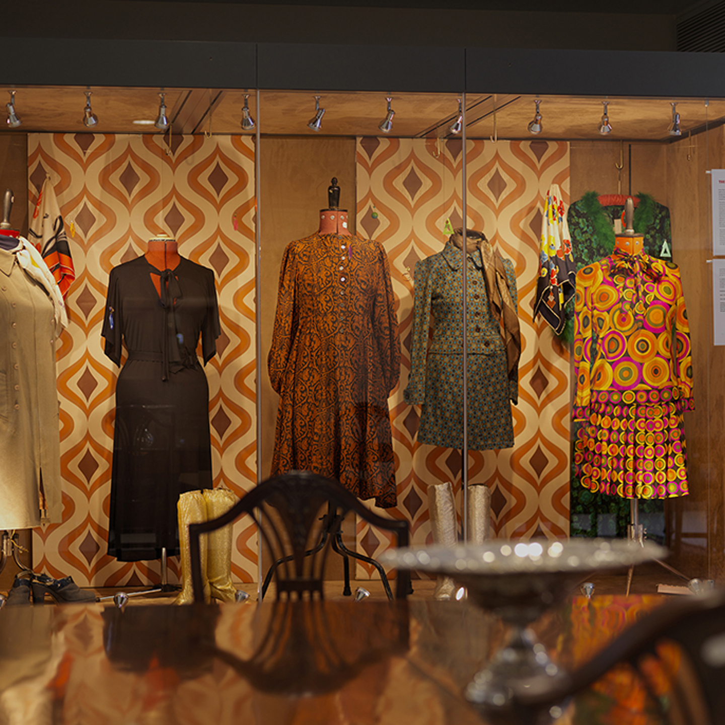 Auction lots on display in a cabinet