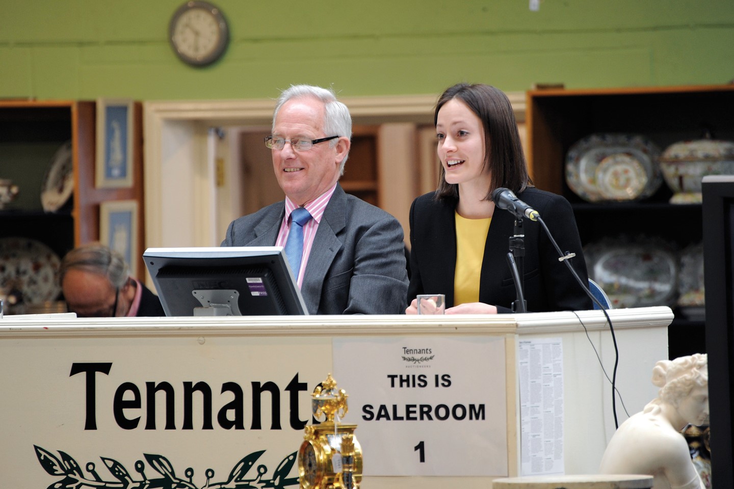 Auctioneers on the rostrum